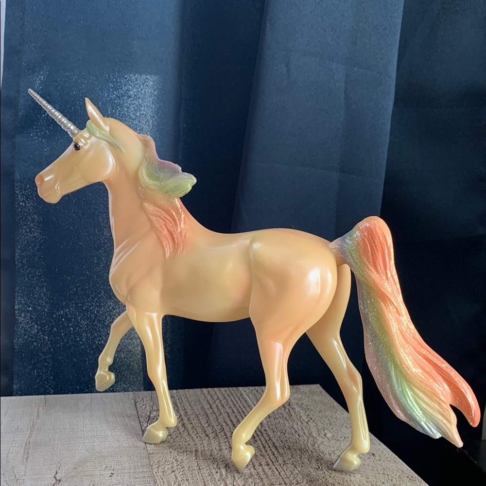 Breyer- 'Skyler' rainbow unicorn with silver horn